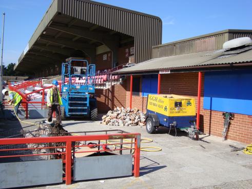 The end wall from block K demolished.