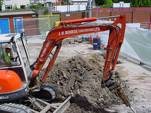 Preparing the ground for linking the piles together.