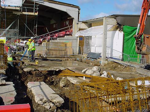 Pumping out the water from the foundations.